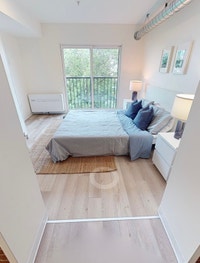 Modern and comfortable unit featuring: Stainless steel fridge Efficient heat pump Window coverings i... (image 1)