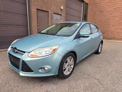 2012 Ford Focus SEL Green on Beige Leather interior 248,000 kms 5 speed Manual, AC, power sunroof, w...