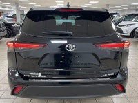 The citys lights ripple across wet pavement as the Midnight Black Metallic finish glides past, its L... (image 4)