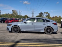 Look at this certified 2022 Honda Civic Hatchback Sport Touring | 6-Speed Manual | Leather | Sunroof... (image 1)