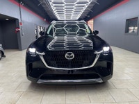 The 2024 Mazda CX-90 PHEV GT in a stunning black finish offers the perfect blend of luxurious style... (image 6)