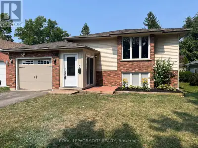 Welcome to 730 John Street. This raised ranch, semi-detached home is connected only at the garage! N...