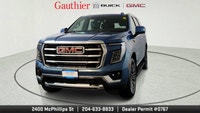 The 2025 GMC Yukon Elevation combines bold styling, spacious versatility and powerful performance in... (image 5)