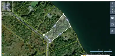 2.8 acre waterfront lot on the Bras d'or Lake with a driveway already in place, power at the street...