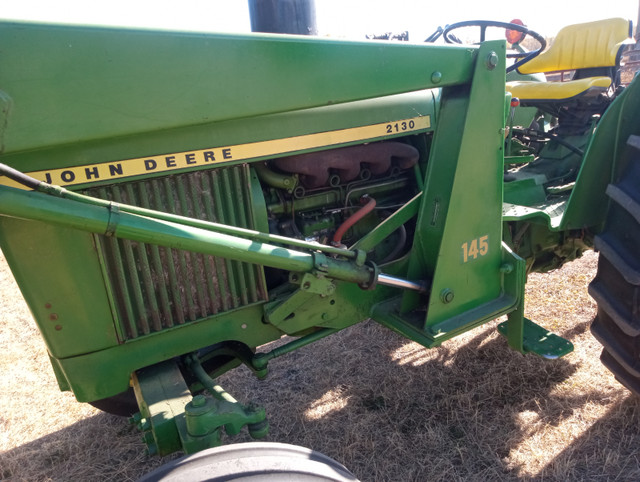 JOHN DEERE 2130 WITH LOADER AND GRAPPLE FORK in Farming Equipment in Red Deer