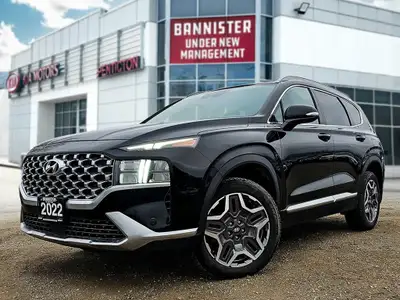 The 2022 Hyundai Santa Fe Hybrid Preferred in sleek Black with an AWD drivetrain offers balanced han...