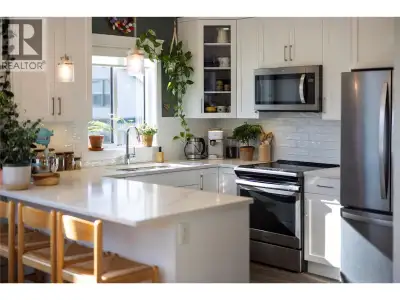 Modern corner unit townhome in the Heart of Harwood - Step into modern living with this beautifully...