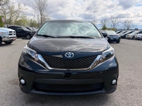 Looking for a reliable and spacious family vehicle? Check out this sleek black 2011 Toyota Sienna SE... (image 1)