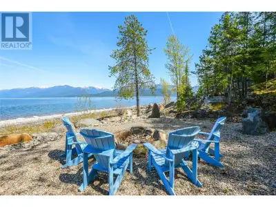 Build your very own waterfront home on this prime lot with 113 feet of pristine lake frontage on Koo...