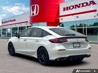 Boasting a spirited turbocharged engine, this 2022 Honda Civic Hatchback Sport Touring redefines dyn... (image 4)