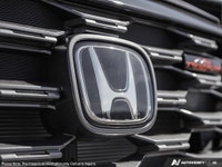 Introducing the 2026 Honda Ridgeline TrailSport AWD, a striking new truck that's unmissable in its b... (image 7)