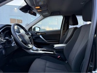 The 2024 Mitsubishi Eclipse Cross in a striking black finish is designed to tackle any road with its... (image 8)