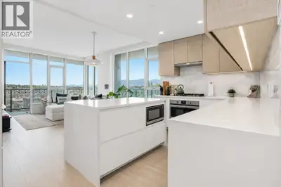 Rare corner home at Gilmore Place by Onni, set directly on the SkyTrain line in Burnaby's vibrant Br...