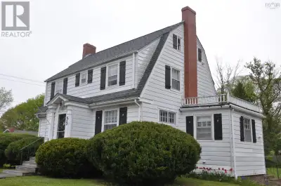 Welcome to this Dutch Colonial, built in 1936, located on a quiet, private double lot in the heart o...