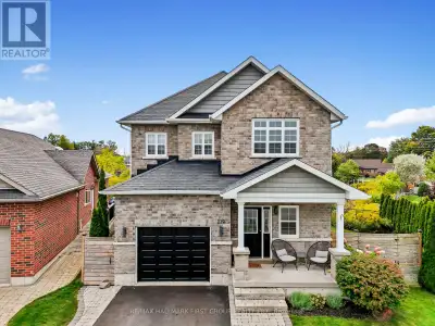 In the desirable East Village community, this turnkey three-bedroom home features a finished basemen...