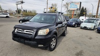 Take on Alberta roads with confidence in this well-equipped 2006 Honda Pilot EX-L! Known for its leg... (image 1)
