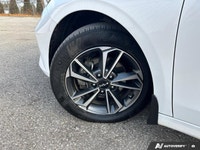 The 2024 Kia Forte EX, finished in striking Snow White Pearl, instantly elevates your daily commute... (image 9)