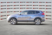Experience advanced driver-assist technology in this 2019 Honda CR-V LX. This sleek gray Sport Utili... (image 1)