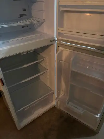 24 inch fridge and stove. White apartment size, View more
