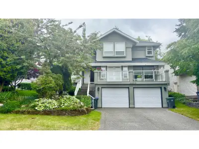 Beautifully maintained 4-bed home in prime West Cloverdale, directly across from Guy Richardson Park...