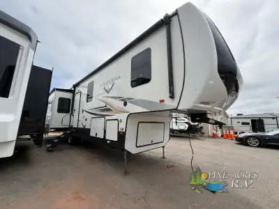 Forest River Cedar Creek Champagne Edition fifth wheel 38EL highlights: Pull-Out Dinette Kitchen Isl...
