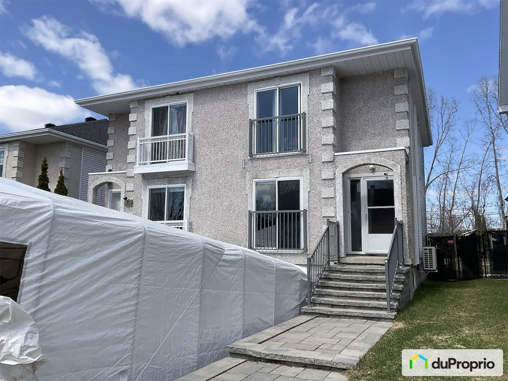 $574,900 - Semi-detached for sale in Ste-Rose — photo 1