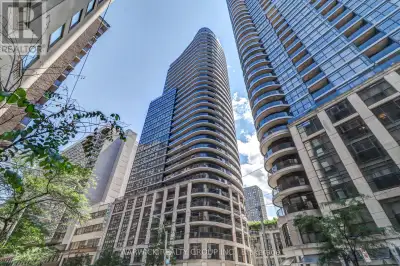 This bright residence features a welcoming open layout with floor to ceiling windows, offering abund...