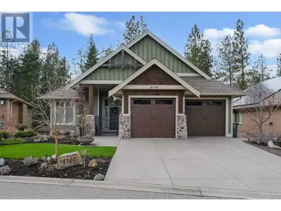 This immaculate walkout rancher is located on one of the most coveted streets in the prestigious Gal...