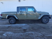 For a quick response please text 403-820-9940. AMVIC licensed business The 2026 Jeep Gladiator Sport... (image 3)