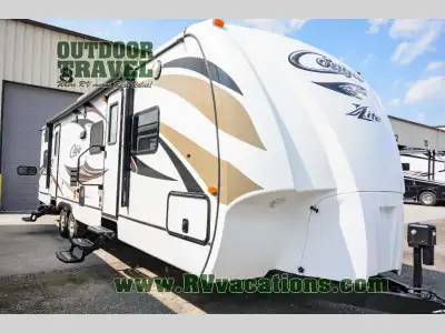 The kids are going to love this one! Cougar X-Lite model 31SQB features a bunkhouse that will be the...