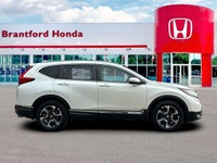 Why Choose the CR-V Touring? The Touring trim eliminates the need to upgrade or compromise on featur... (image 7)