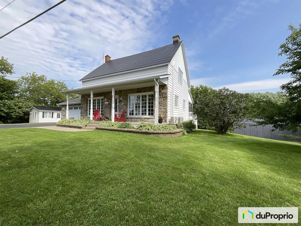 $869,000 - 2 Storey for sale in Ste-Martine — photo 1