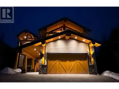 Escape to the mountains in this one-of-a-kind custom built log post and beam home that blends modern...