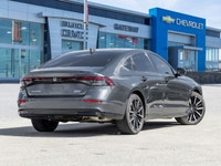 The 2024 Honda Accord Hybrid Touring commands attention in a refined Grey finish that highlights its... (image 4)