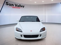 Feel the wind in your hair as you cruise the open road in a Honda S2000. With keyless entry for conv... (image 2)