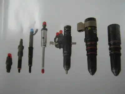 REBUILT AFTERMARKET INJECTORS FOR ALL ENGINES CATERPILLAR DETROIT CUMMINS NAVISTAR MACK PLEASE SUPPL...