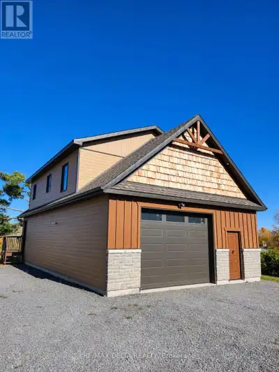 Waterfront 2-Bedroom Upper level Apartment - All-Inclusive! Nestled on a private 3-acre lot, this ne...