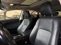 The NX 200t is characterized by its aggressive "spindle" grille and sharp, angular body lines. As th... (image 5)