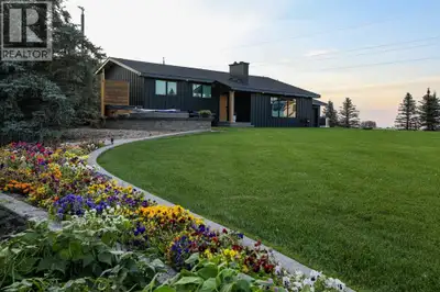 Beautifully renovated bungalow offering over 2,900 sq. ft. of developed living space** with 5 bedroo...