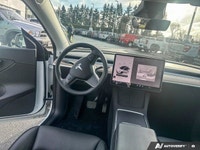 This Tesla Model Y boasts a Electric engine powering this Automatic transmission. Wireless Phone Con... (image 8)