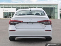 * Dual-zone automatic climate control * Heated, leather-wrapped steering wheel * Heated front seats... (image 3)