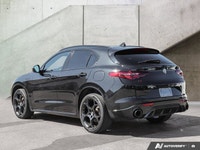 The *2023 Alfa Romeo Stelvio Estrema *offers a refined balance of performance, luxury, and distincti... (image 2)