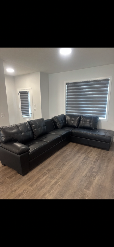 Black leather sectional, View more
