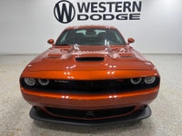 This 2023 Dodge Challenger in the absolutely stunning “Sinamon Stick” colour is pure muscle car atti... (image 1)