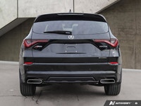 Experience refined performance and bold styling with this *2025 Acura MDX A-Spec*, a luxury SUV that... (image 3)