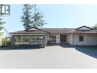 Nestled within the highly esteemed Cypress Park Estates, this striking two-level residence stands as...