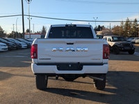 The 2026 Ram 3500 Laramie Crew Cab in Bright White combines heavy-duty capability with premium comfo... (image 4)