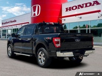 Elevate your capability and comfort with this remarkable 2022 Ford F-150 LARIAT Crew Cab Pickup. Dre... (image 3)