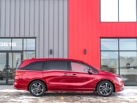 Carget Supercentre is proud to present this 2022 Honda Odyssey Touring! EXTERIOR: RADIANT RED INTERI... (image 4)
