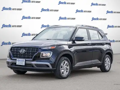 Discover the 2020 Hyundai Venue Preferred: a sleek, black subcompact SUV designed for urban adventur...